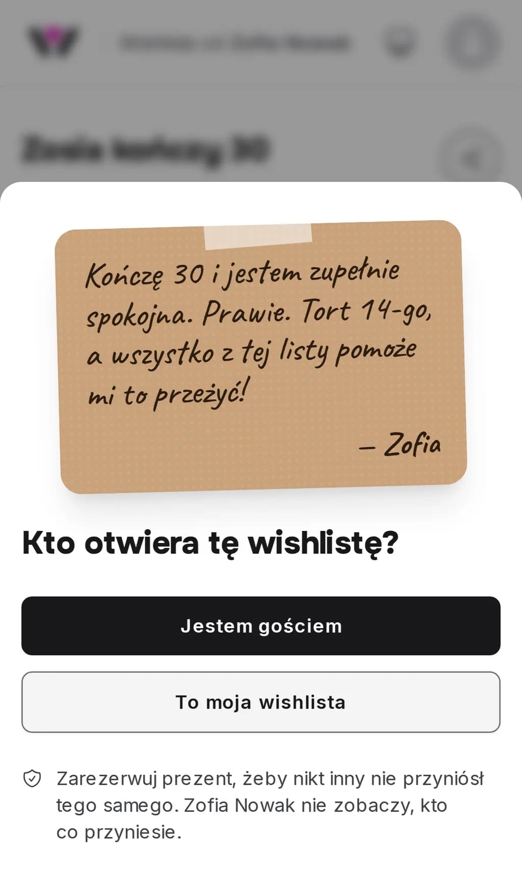 Wejście do wishlisty w telefonie z kartką właściciela napisaną odręcznym pismem i podpisaną imieniem